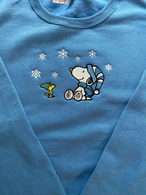 Friends Enjoying Winter Snoopy Embroidered Sweatshirt