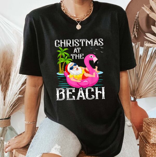 Funny Flamingo Float Santa Claus Christmas At The Beach Shirt