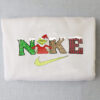 Light Nike Grinch Hand Holding Swoosh Ornament Embroidered Christmas Sweatshirt