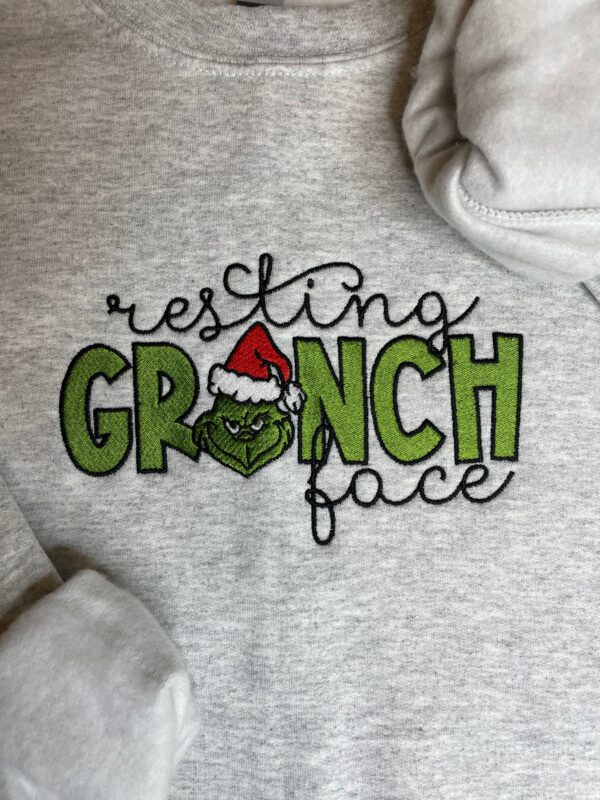 Embroidered Resting Grinch Face Christmas Sweatshirt