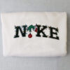 Nike Grinch Hand Holding Ornament Embroidered Sweatshirt