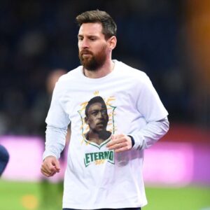 Lionel Messi Wearing a Pele T-shirt